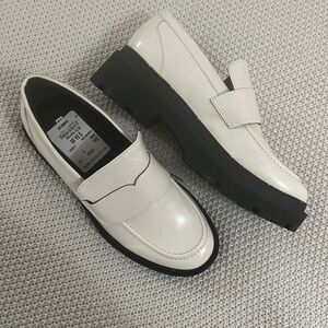 Blondo Dulce Cream Loafers with Black Lug Soles